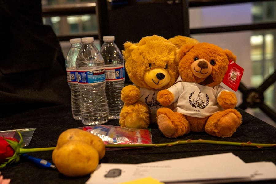 ILMUNC teddy bears in conference t-shirts on the chair's table